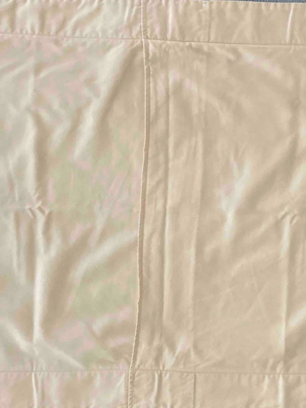 Pair of standard pillow shams in cream